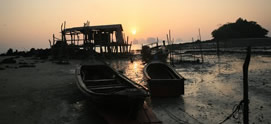 Boat yard sunset on koh yao noi thailand